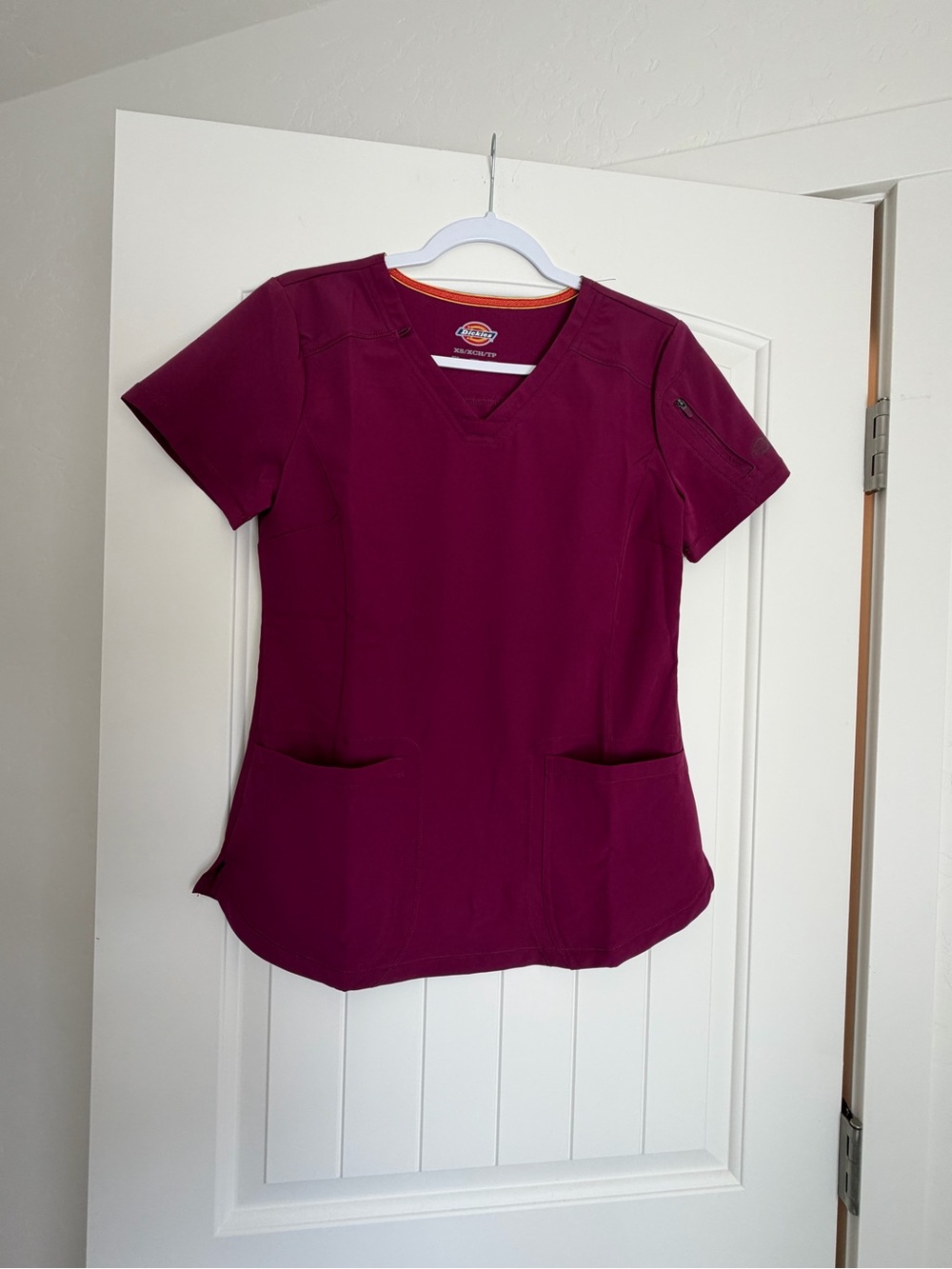 Dickies Womenās Short-Sleeve V-Neck Scrub Top in Berry Plum